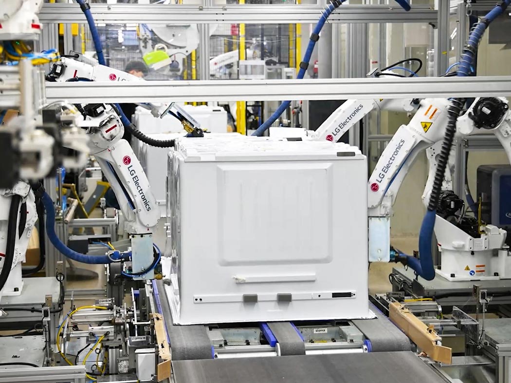 image of several robot arms assembling product in the LG Smart Park